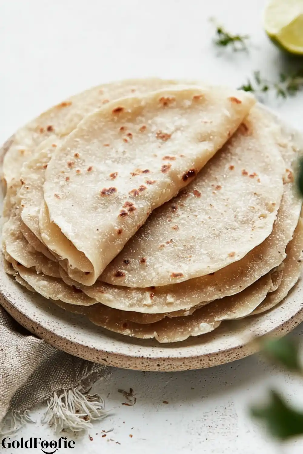 Easy Gluten-Free Tortillas Recipe 5 Close-up of gluten-free tortillas folded and stacked on a plate