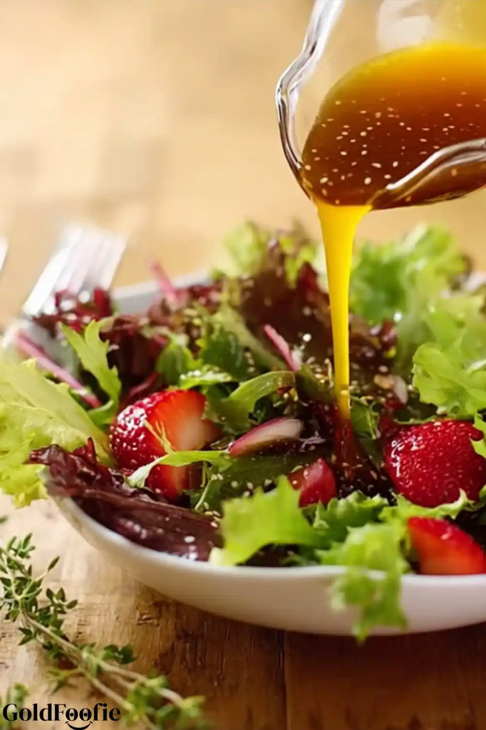 MCT Oil Salad Dressing Recipe 5 MCT Oil Salad Dressing poured over strawberry salad