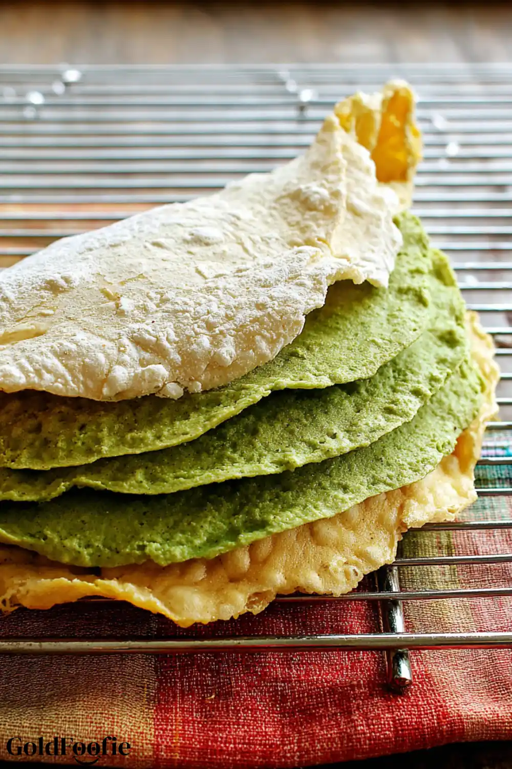 High-Protein Split Pea Tortillas You’ll Love 5 Green and yellow split pea tortillas layered on a wire rack