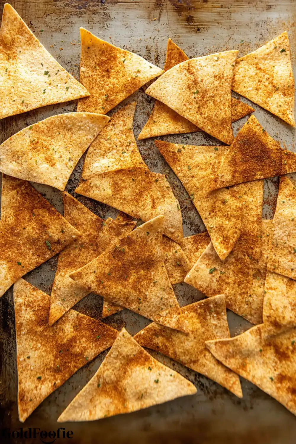 Low Carb Tortilla Chips, Quick Tasty and Simple(No Rolling Dough, only 10 Minutes!) 5 Seasoned tortilla chips spread on a baking tray