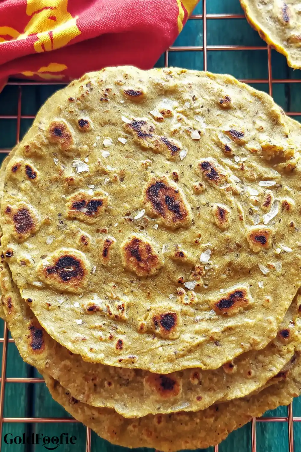 Toasted Chickpea Flour Tortilla with Sea Salt Finish Chickpea flour tortillas topped with flaky sea salt on a cooling rack