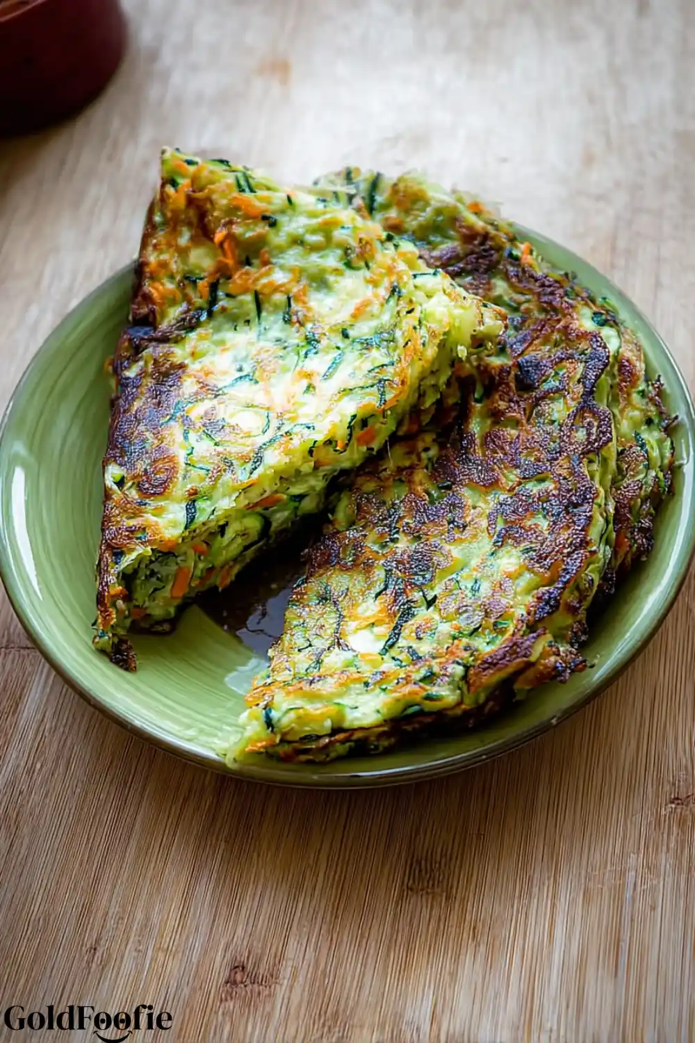 Easy Zucchini Tortillas for Low-Carb Meals 5 Golden zucchini tortillas with carrots on green plate