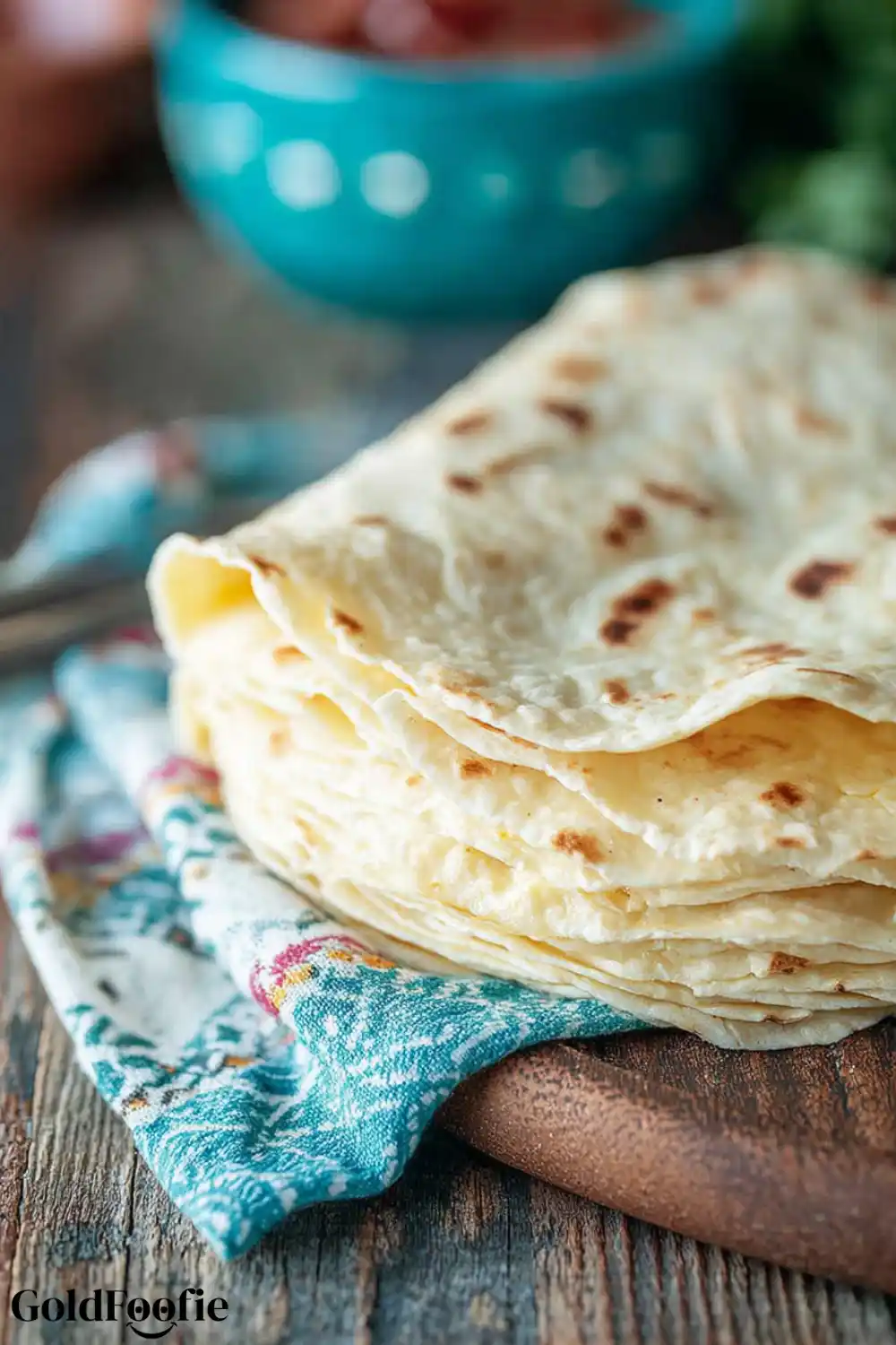 Make the Perfect 12 Inch Flour Tortilla 5 Stack of freshly cooked 12 Inch Flour Tortillas on a wooden board