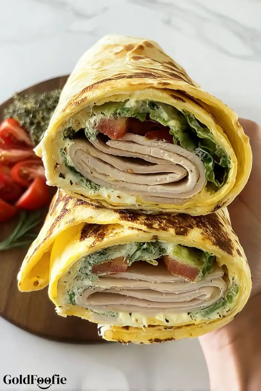 Cheese-Based Wraps for Keto & Gluten-Free Meals 5 Cheese-based wrap with turkey, tomato, and lettuce, rolled