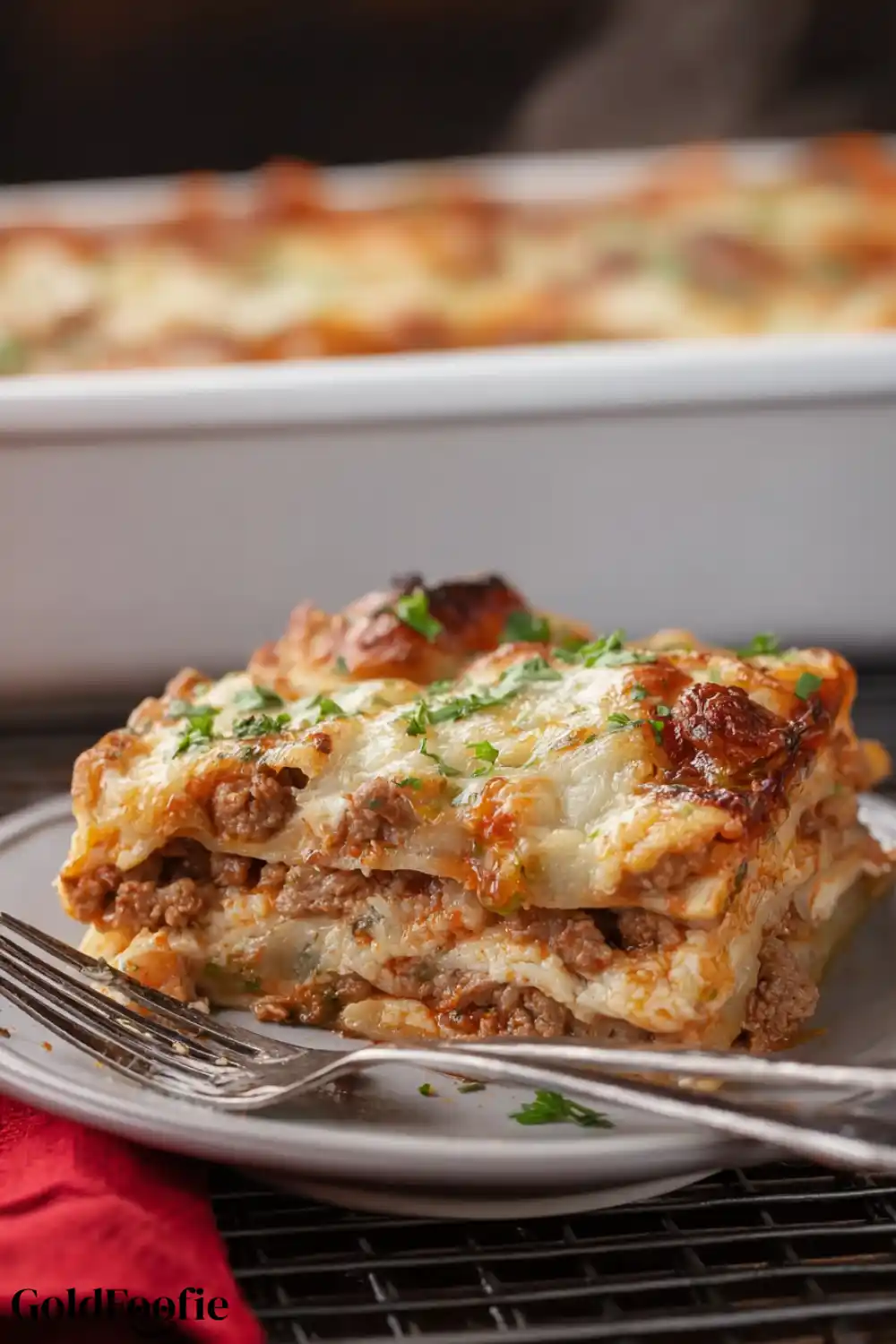 Easy Low Carb Tortilla Lasagna Recipe 5 Slice of low carb tortilla lasagna served on a gray plate
