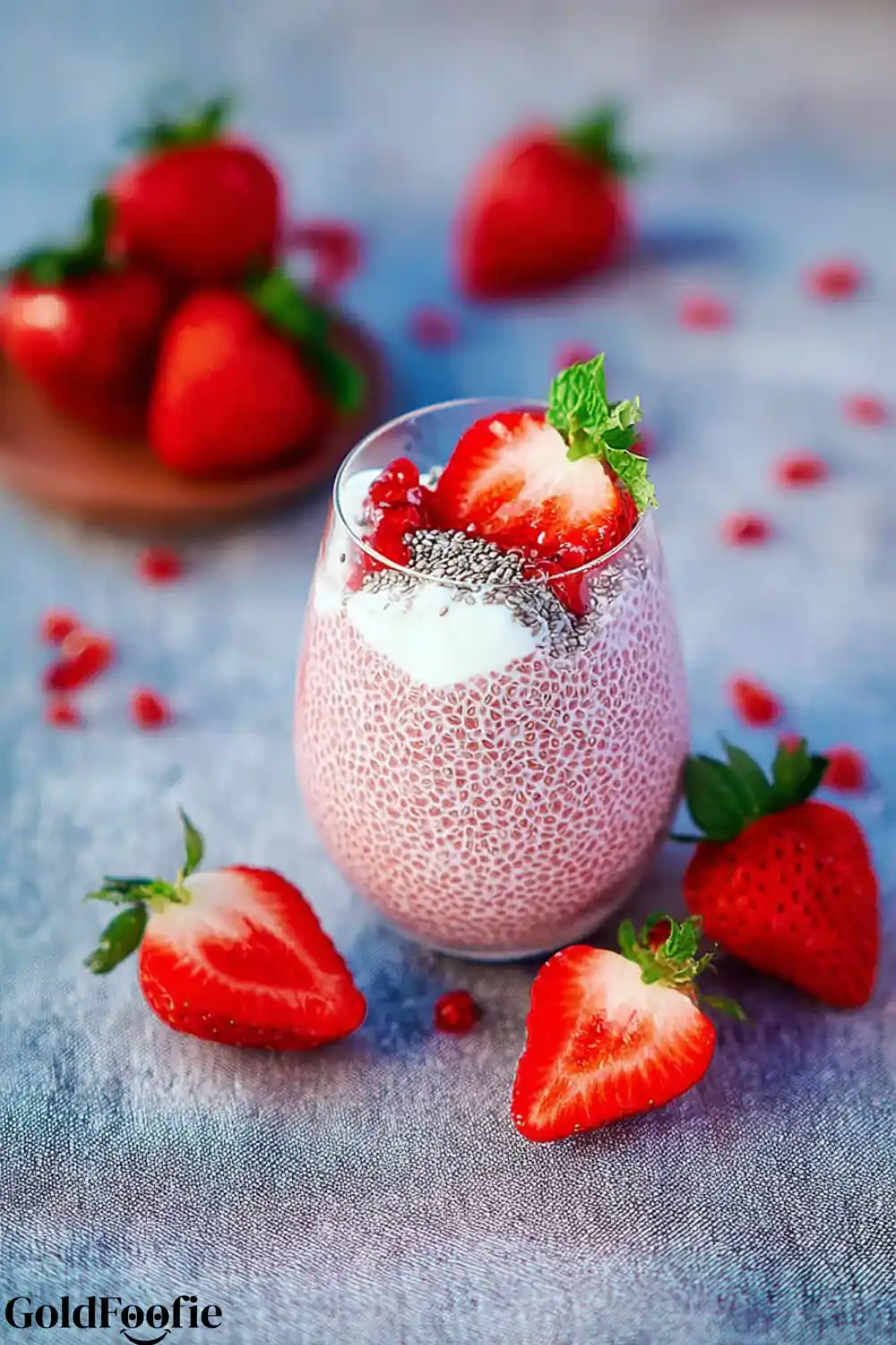 Healthy Strawberry Chia Pudding 5 Strawberry chia pudding garnished with mint, yogurt, and whole berries