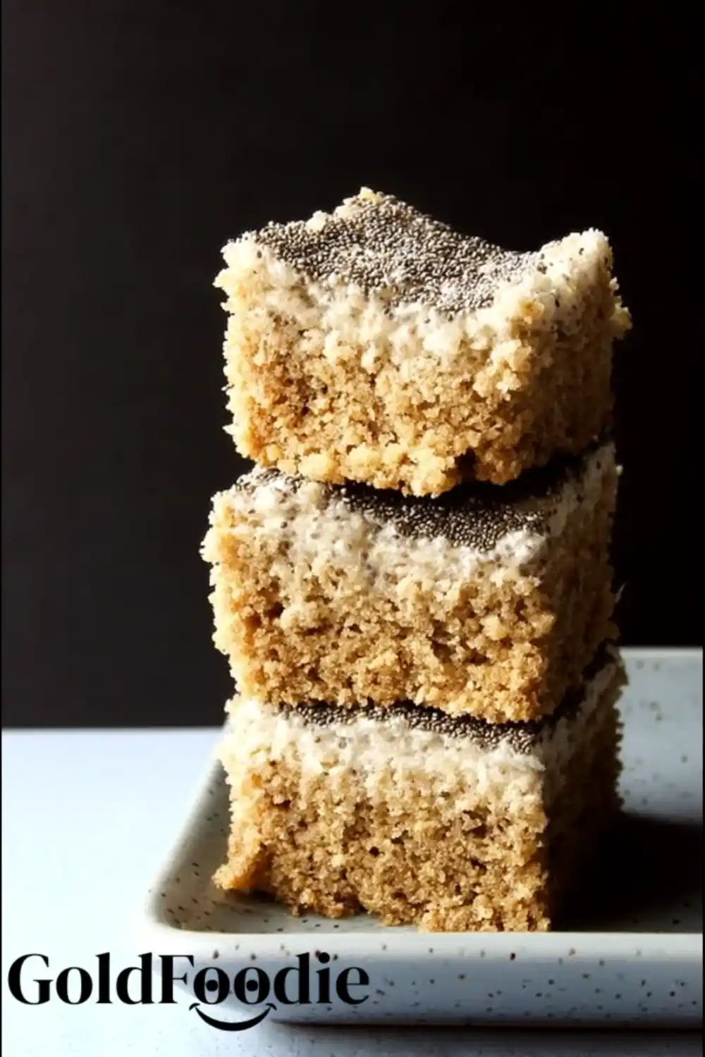 High Protein Eggless Chia Seed Cake 5 Three stacked slices of eggless chia seed cake