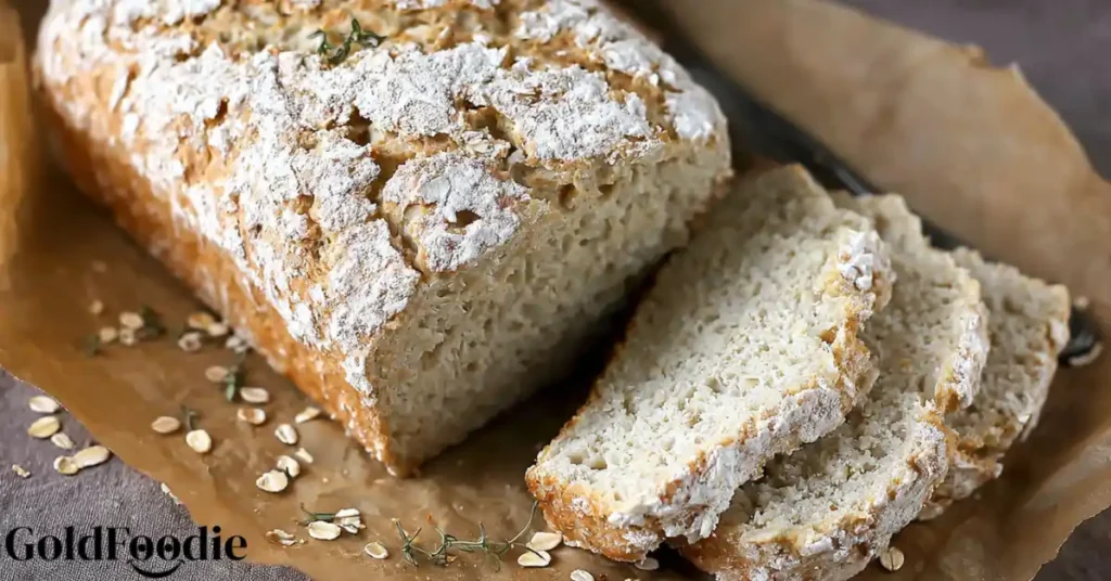 Sliced loaf of gluten-free oatmeal bread.
