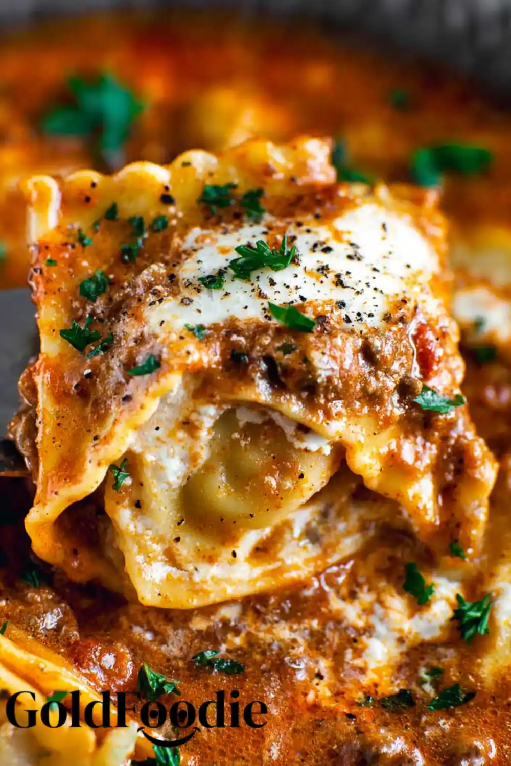 Lasagna Ravioli Close-Up Close-up of cheesy ravioli in tomato meat sauce