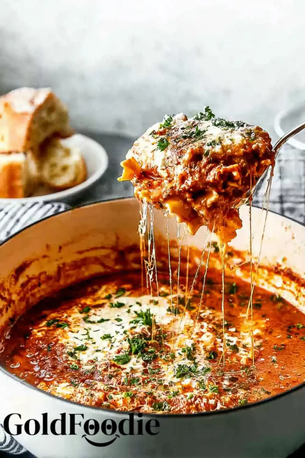 One-Pot Lasagna Soup Scoop Large ladle of cheesy lasagna soup recipe