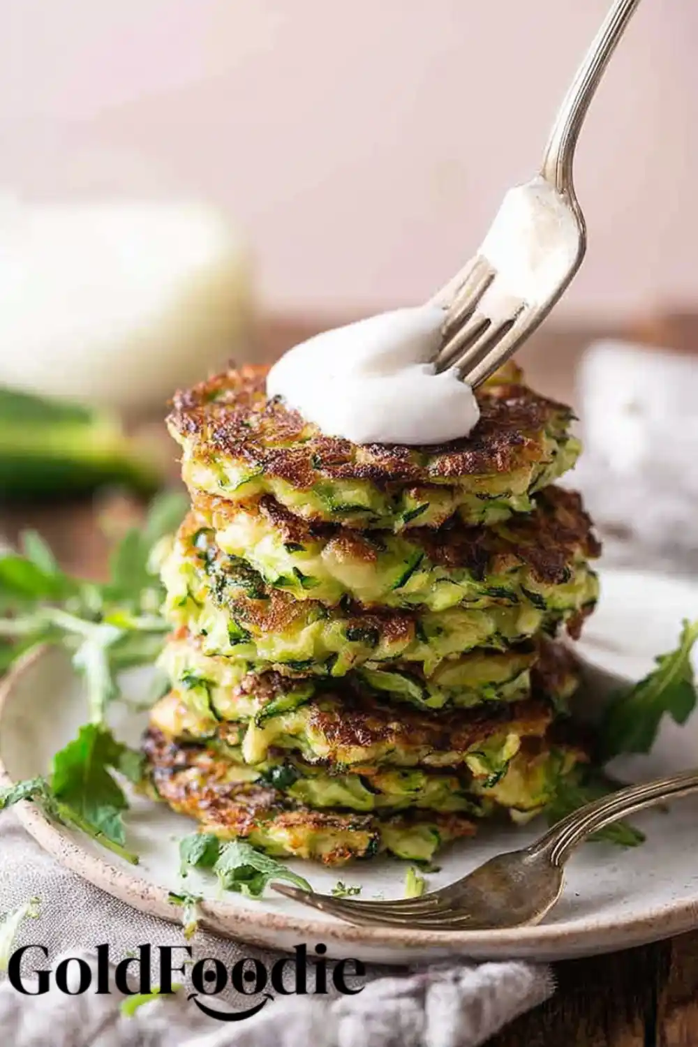Fork Dipping into Zucchini Fritters Zucchini Fritters