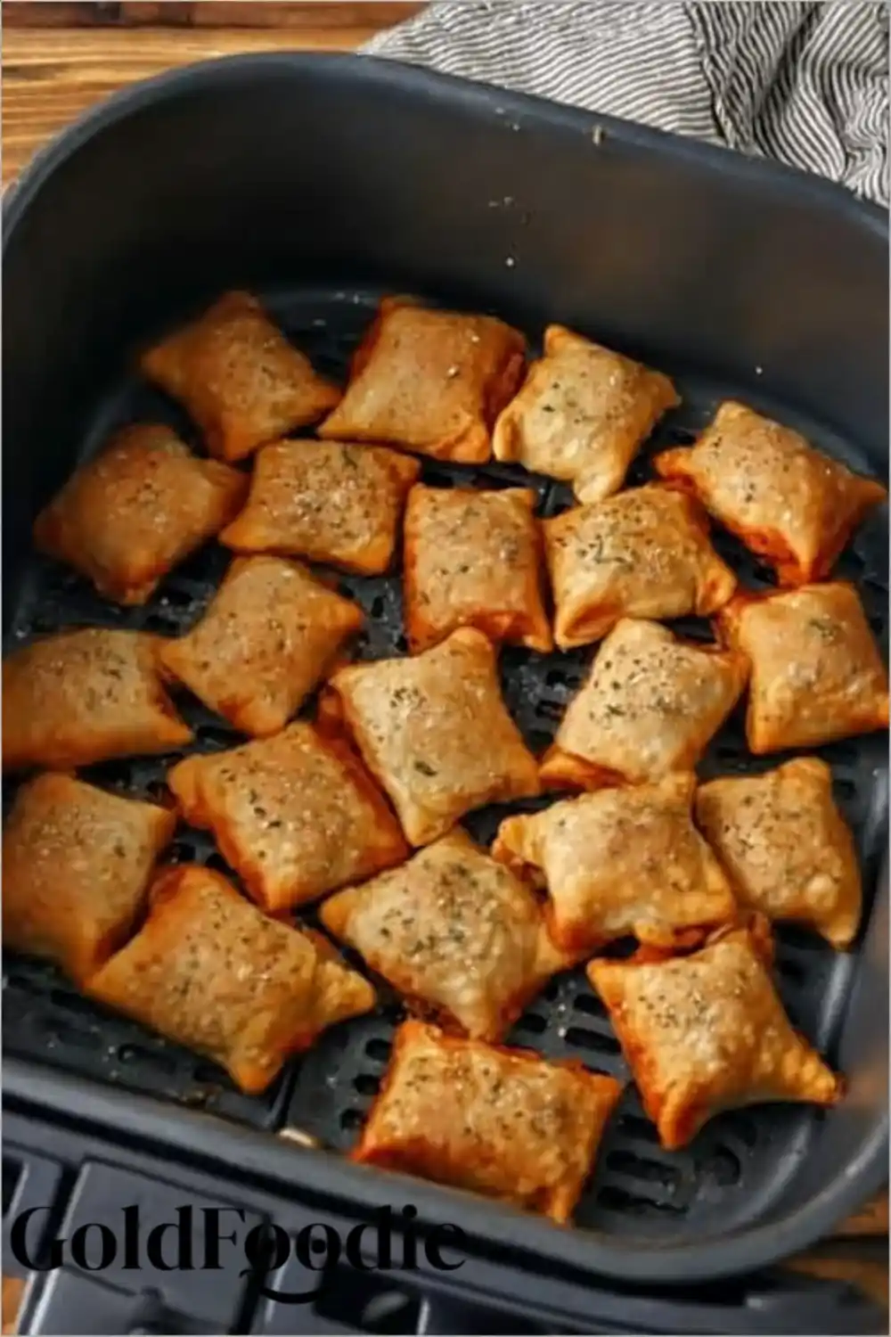 Pizza Rolls Cooking in Air Fryer Basket Pizza Rolls Cooking in Air Fryer Basket
