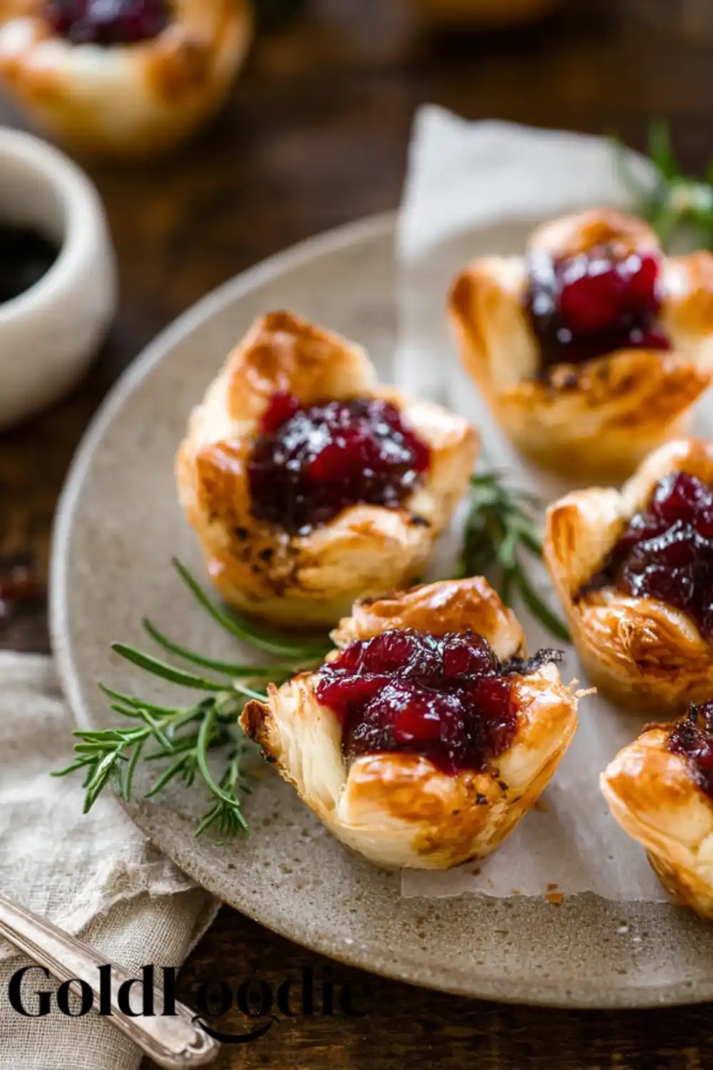 Plate of Festive Cranberry Brie Appetizer Bites Cranberry Brie Appetizer Bites