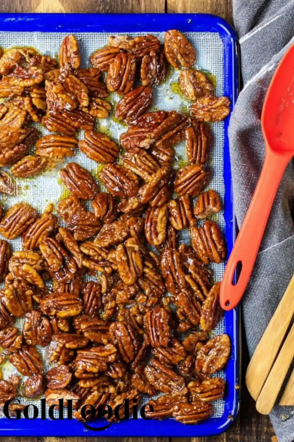 gingersnap-pecans-on-baking-sheet The coated gingersnap pecans spread