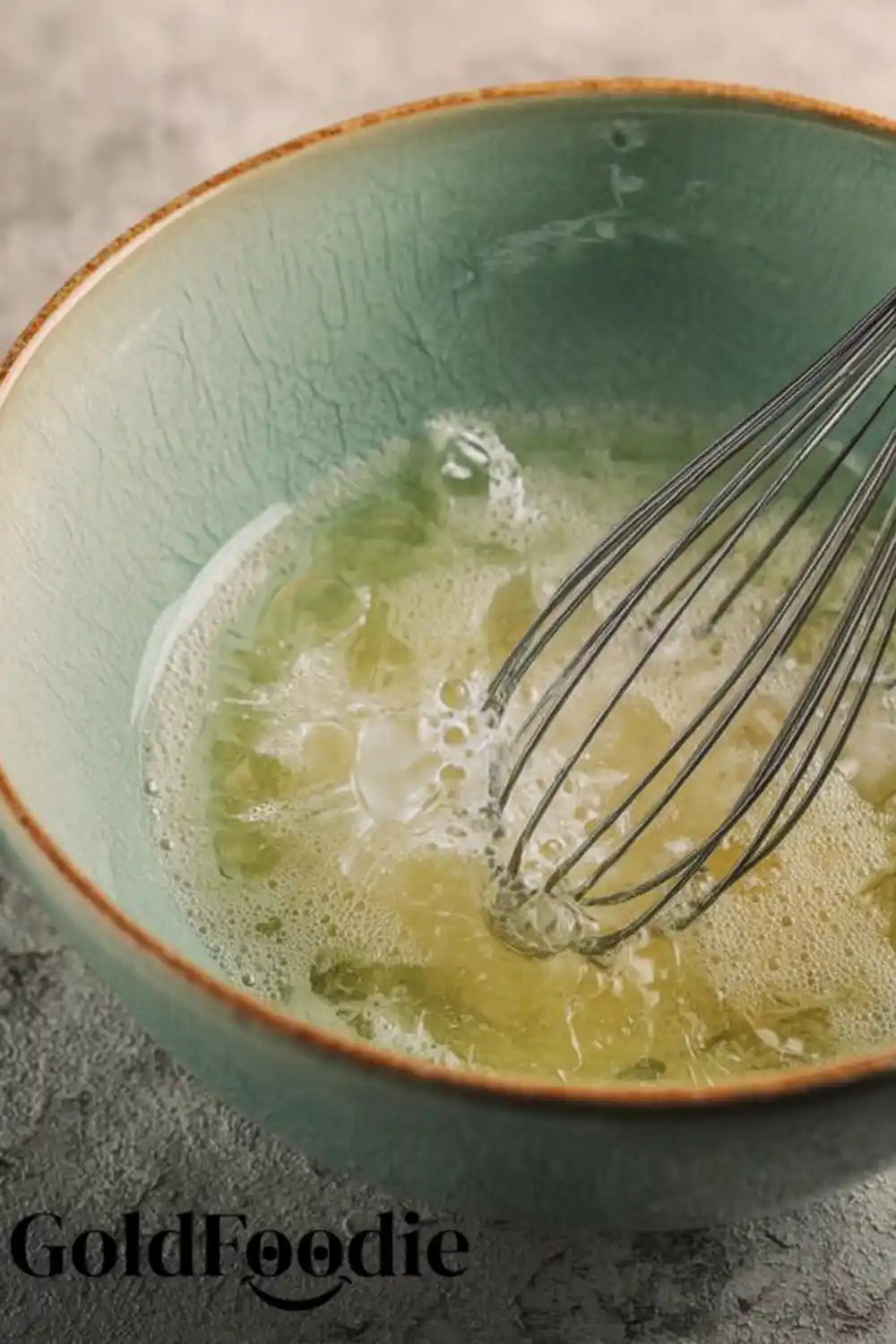 Blooming Gelatin in a Bowl with Whisk Blooming Gelatin
