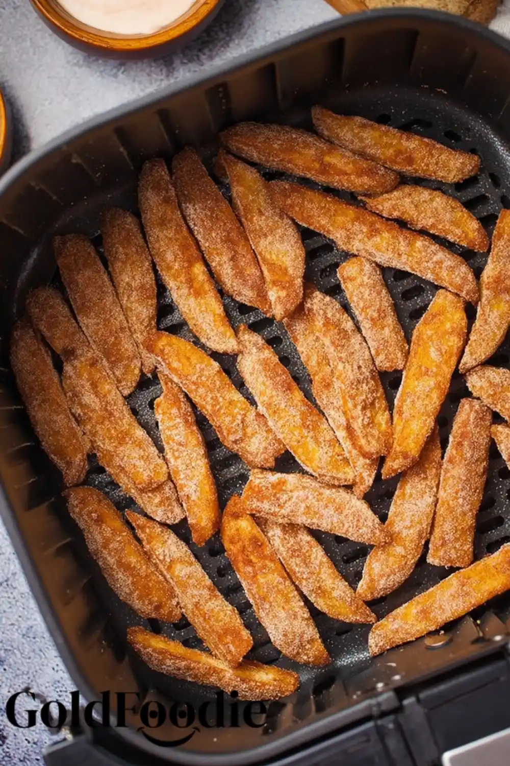Coated Apple Fries in Air Fryer Basket Coated Apple Fries in Air Fryer Basket