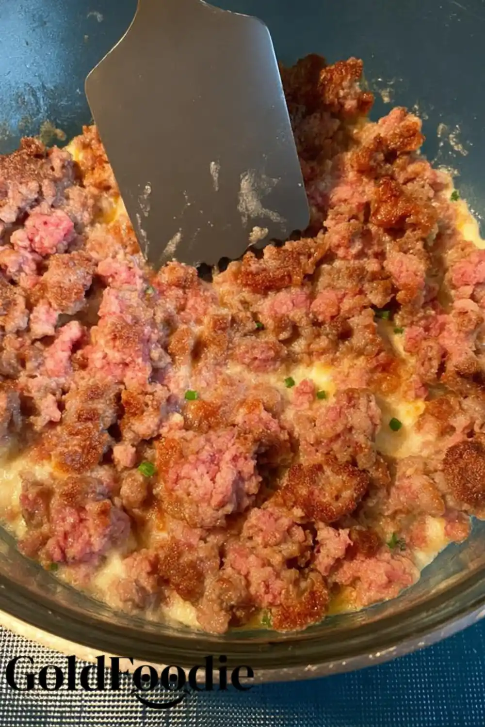 Mixing Sausage into Egg Casserole Mixture Mixing Sausage into Egg Casserole Mixture