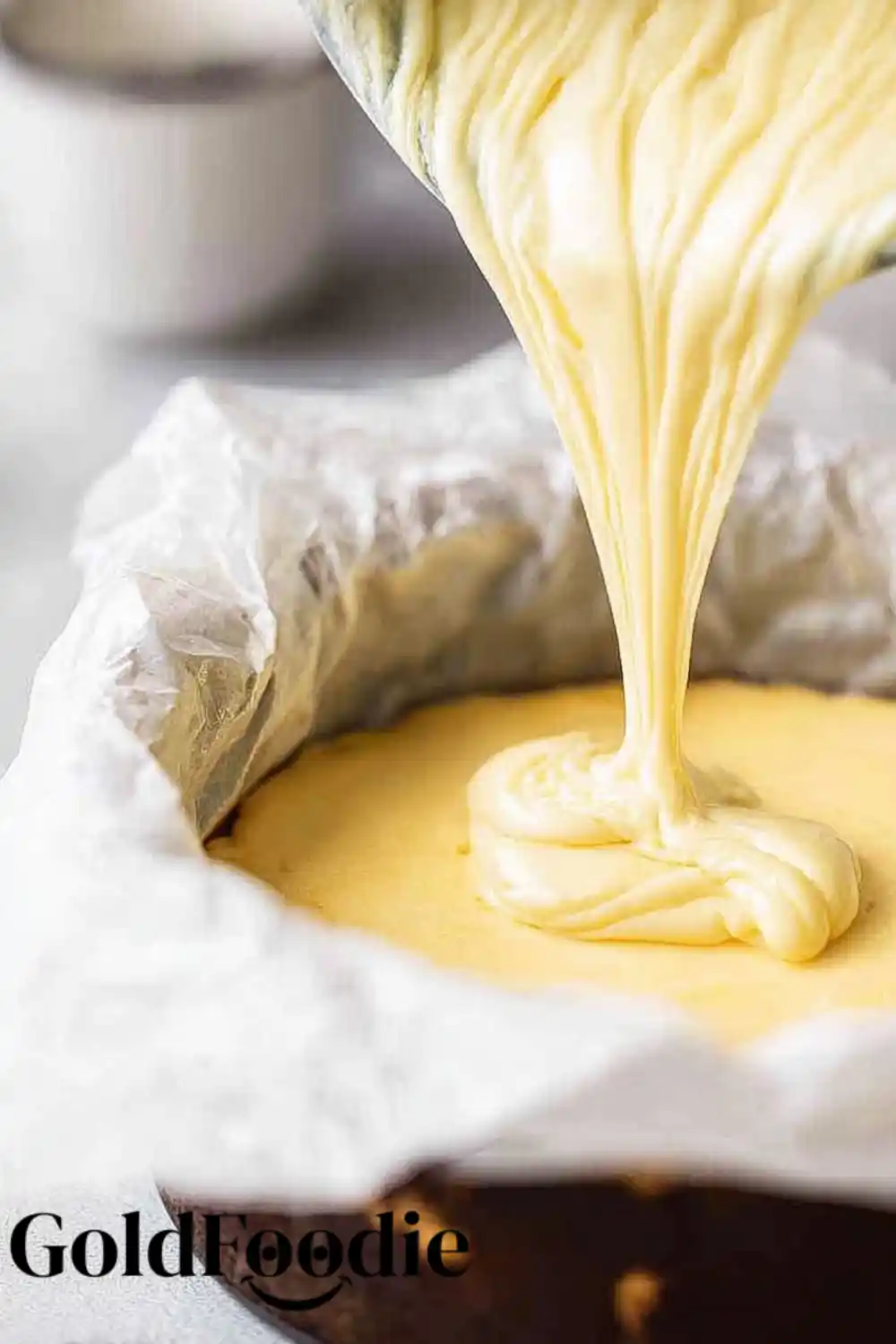 Pouring Burnt Basque Cheesecake Batte