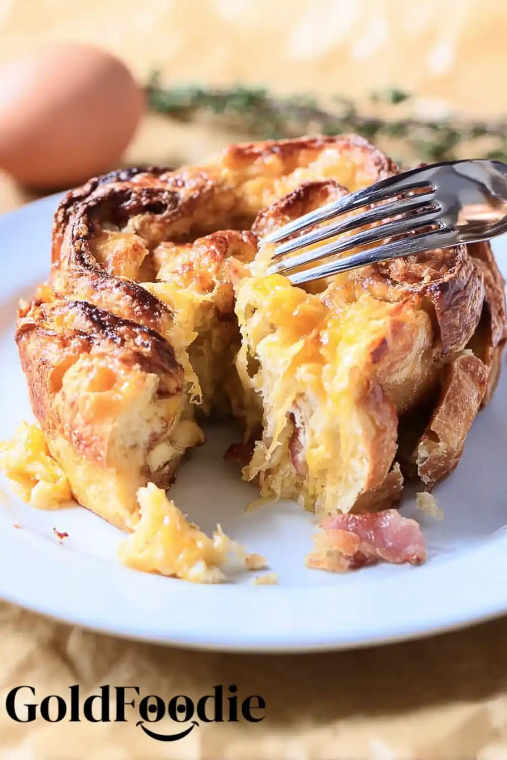 Serving of Croissant Breakfast Casserole on Plate Serving of Croissant Breakfast Casserole