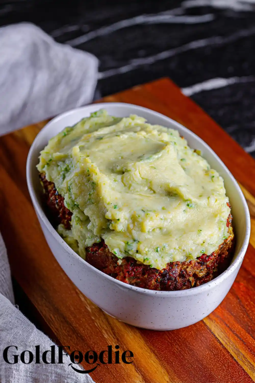 Spreading Mashed Potatoes on Meatloaf