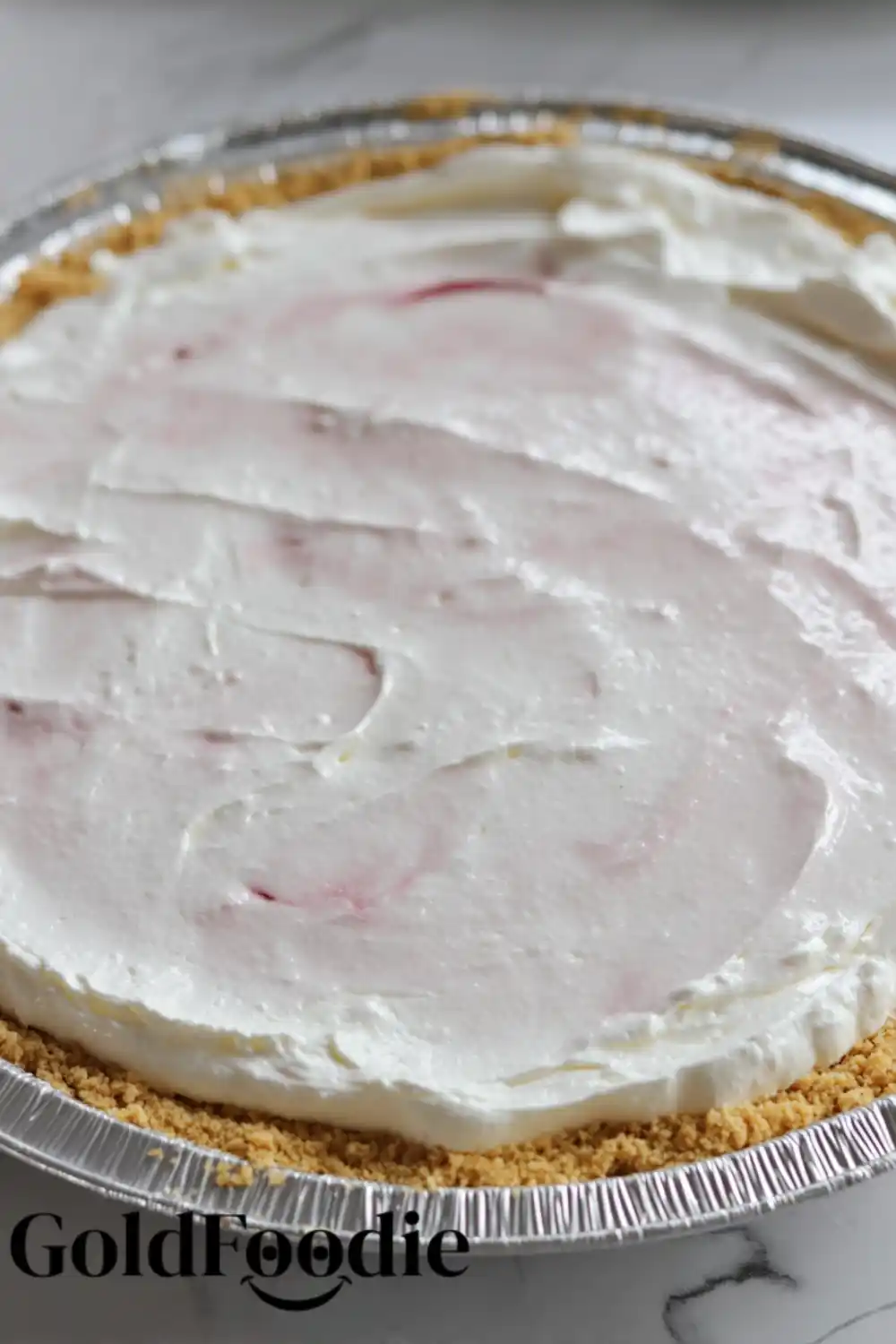Spreading No-Bake Cherry Cheesecake Filling