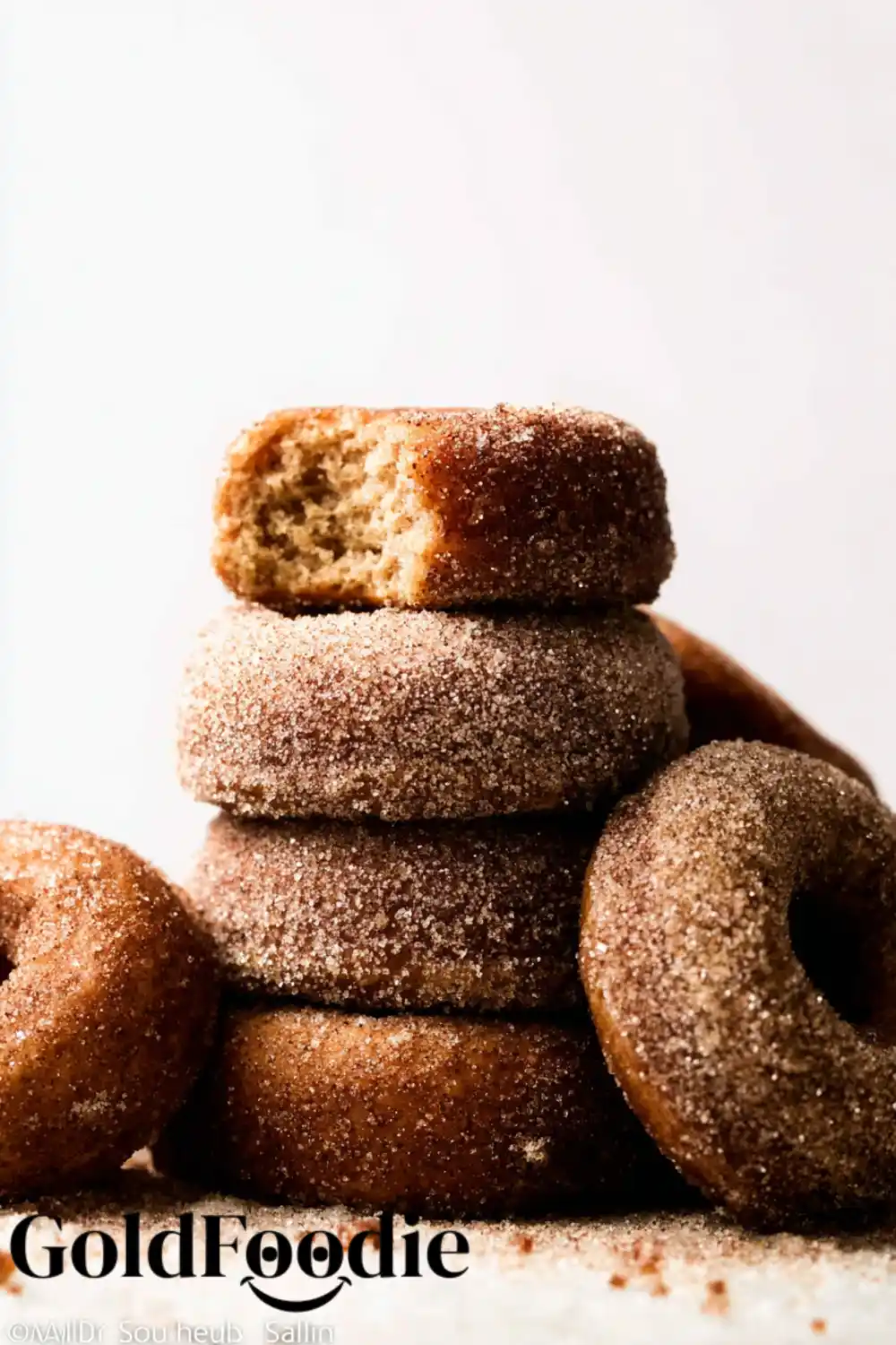 Baked Apple Cider Donuts 5 baked-apple-cider-donuts-stack-with-bite