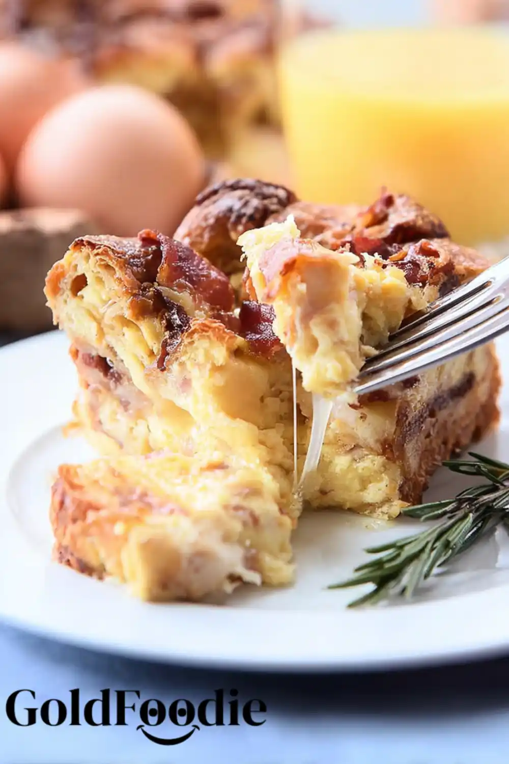 Overnight Croissant Breakfast Casserole 5 cheesy-bacon-croissant-casserole-cheese-pull