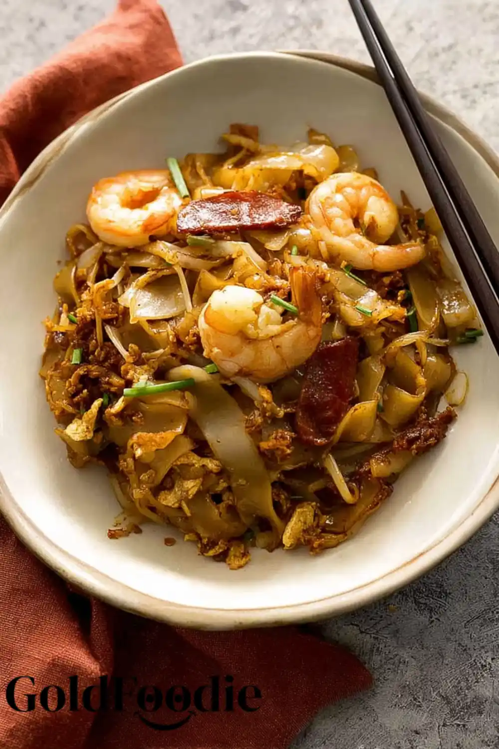 Plated Char Kuay Teow with Prawns and Sausage Plated Char Kuay Teow with Prawns and Sausage