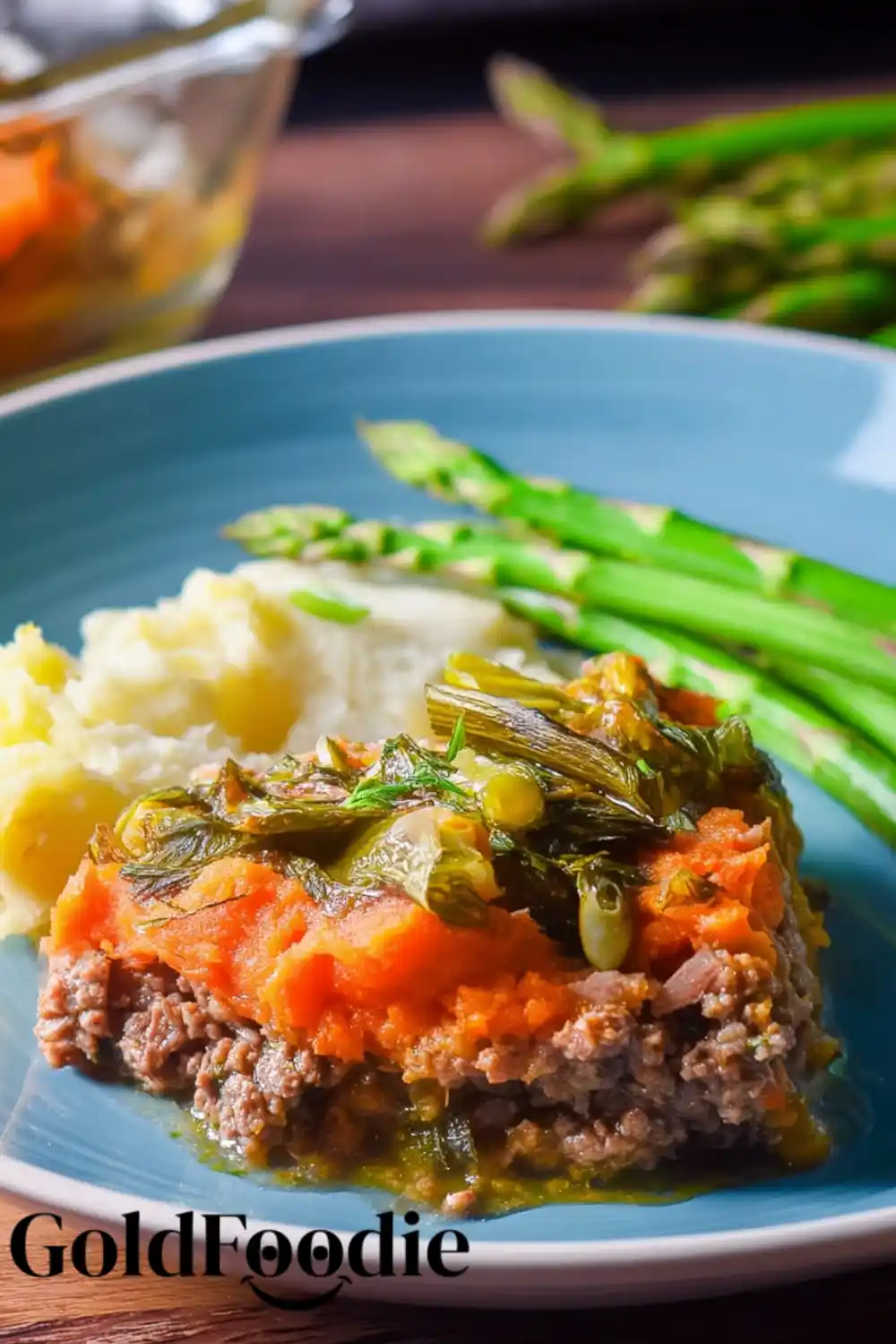 Plated Shepherd's Pie with Yam Topping, Mash, and Asparagus Shepherd's Pie Casserole with Yam Topping