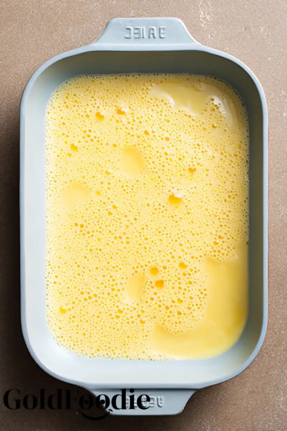Pouring Egg Mixture into Baking Dish
