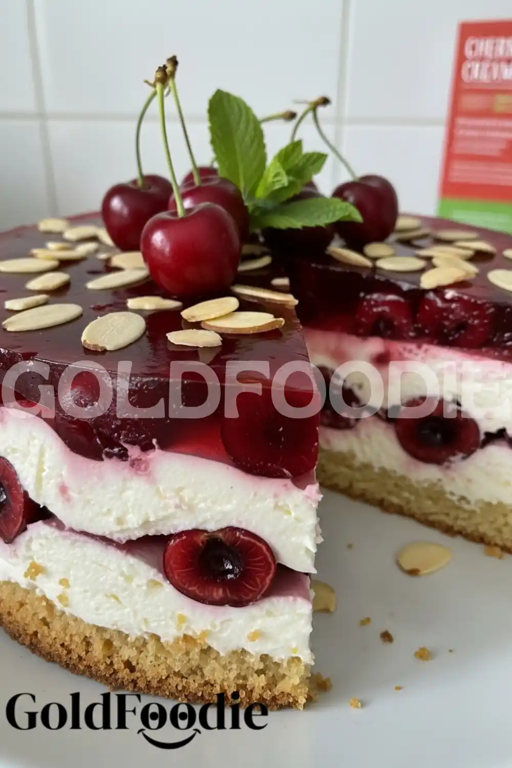 Finished Cherry Gelatin Cream Cake with Almonds and Mint Finished Cherry Gelatin Cream Cake with Almonds and Mint