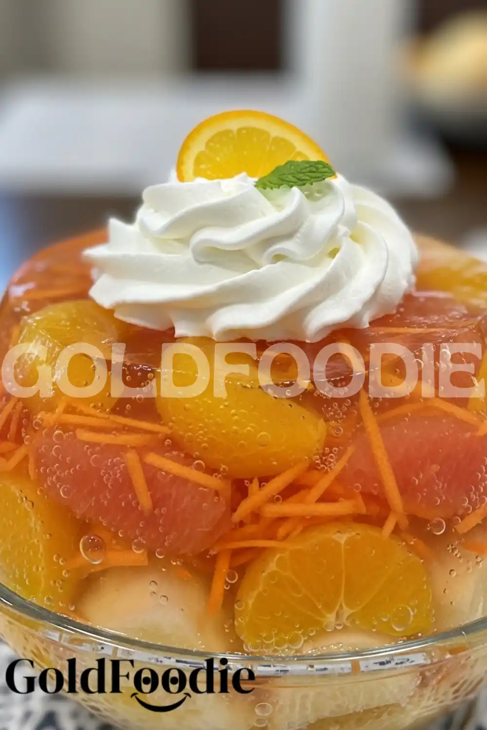 Layered Citrus Gelatin Salad in Glass Bowl Layered Citrus Gelatin Salad in Glass Bowl