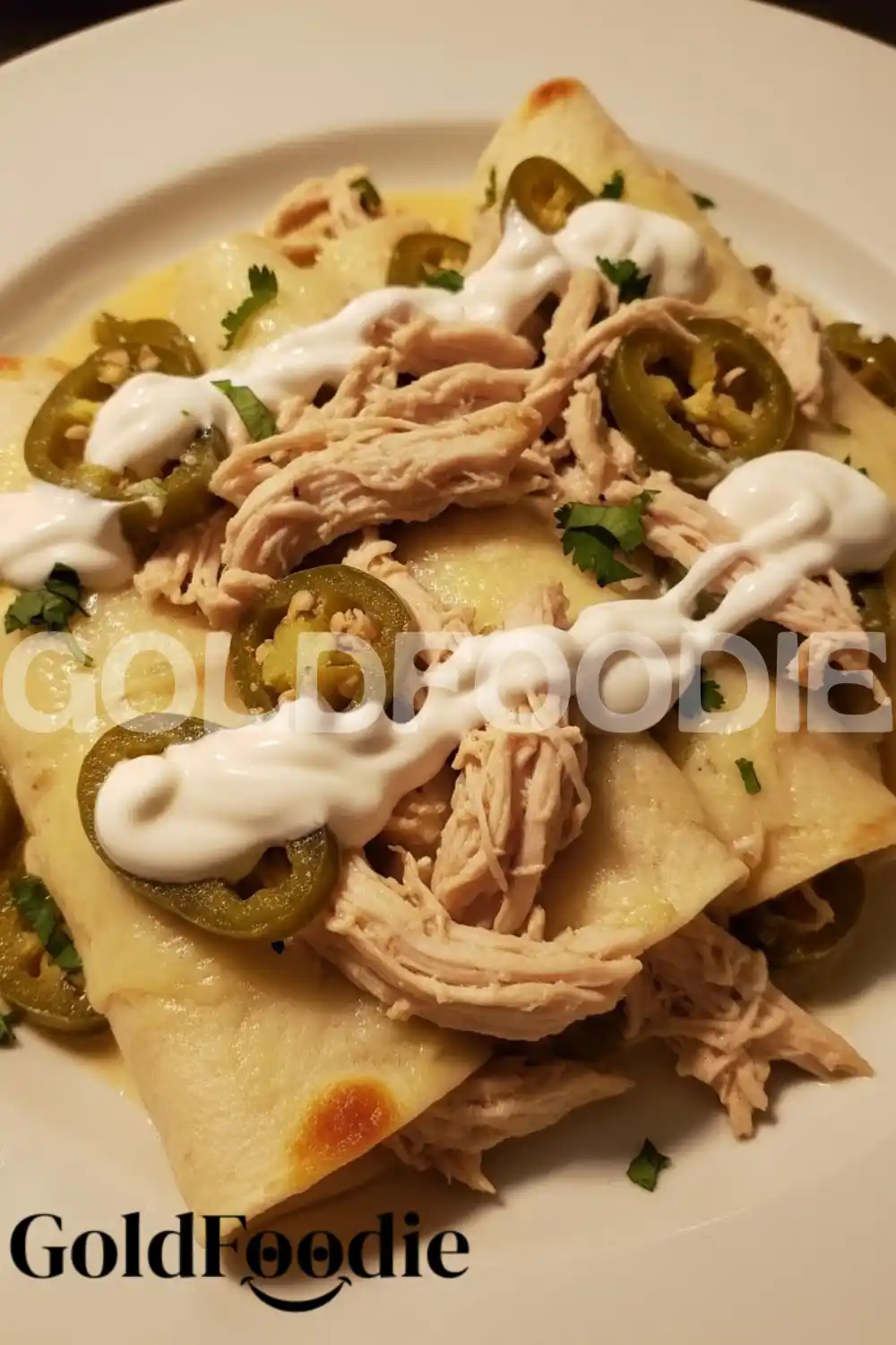 Shredded Chicken Enchiladas with Sour Cream and Jalapeños