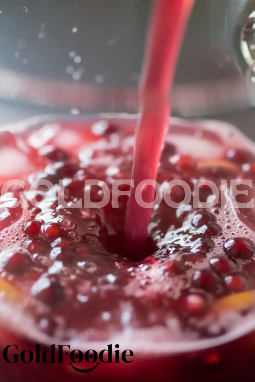 Pouring Refreshing Cranberry Pomegranate Punch