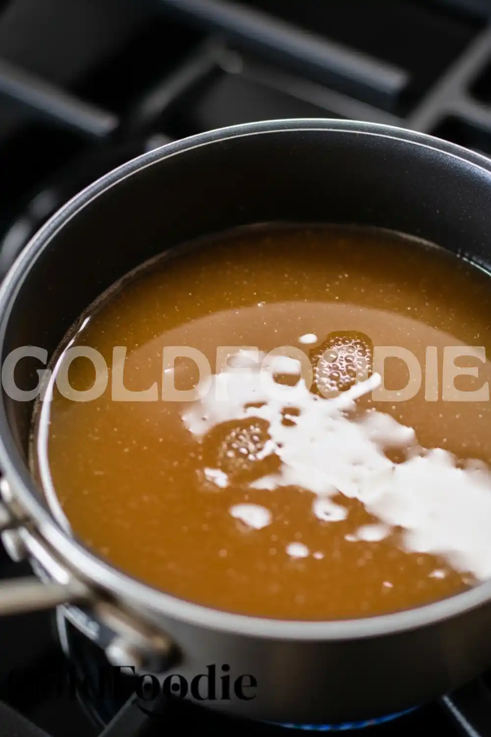 Reducing Apple Cider in Saucepan Reducing Apple Cider in Saucepan