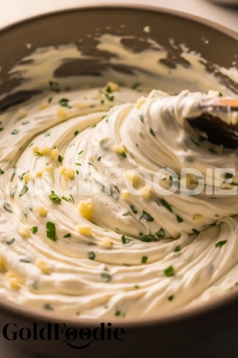 mixing-garlic-herb-cream-cheese-spread