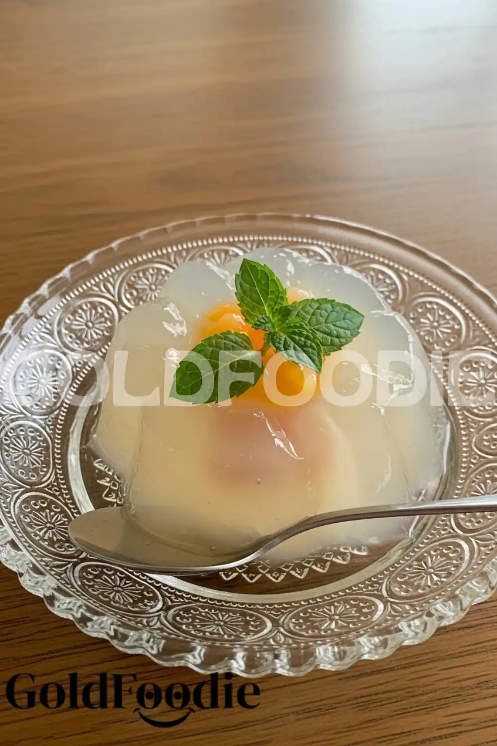 Clear Fruit Gelatin with Mint Garnish