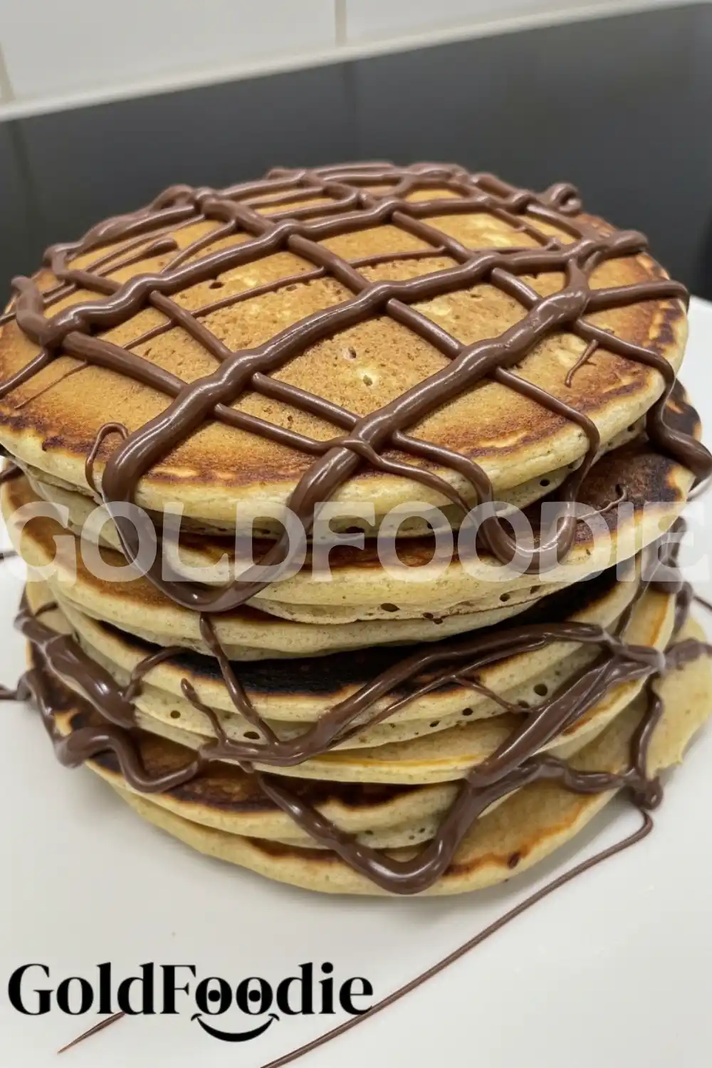 Nutella Pancake Stack with Cross-Hatch Drizzle Nutella Pancake Stack with Cross-Hatch Drizzle