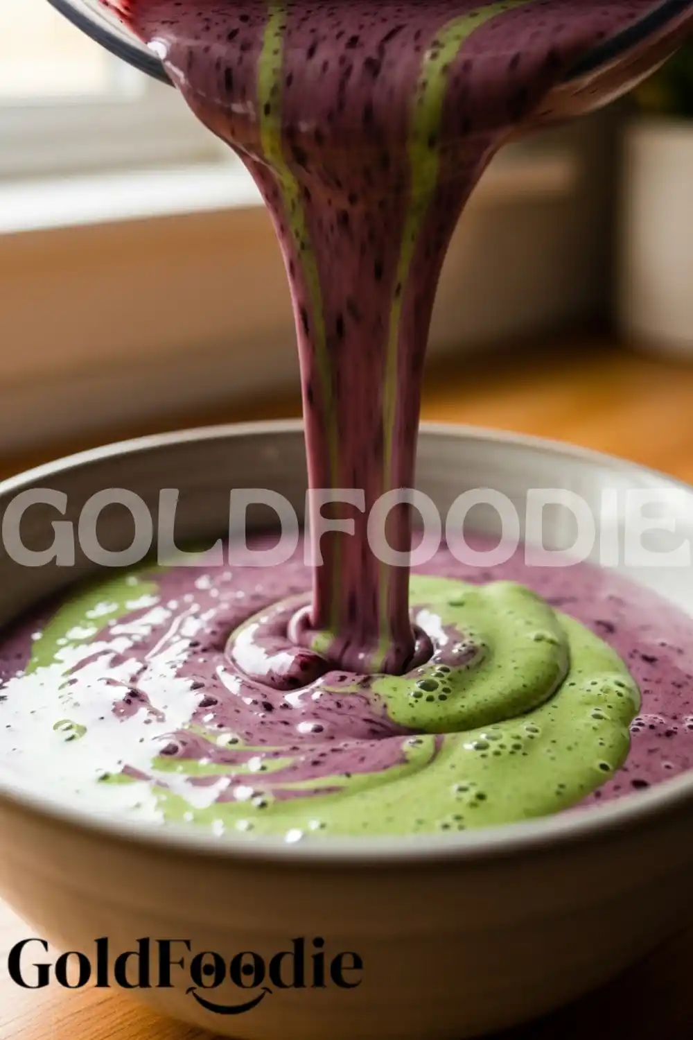 Pouring Mixed Berry and Spinach Smoothie