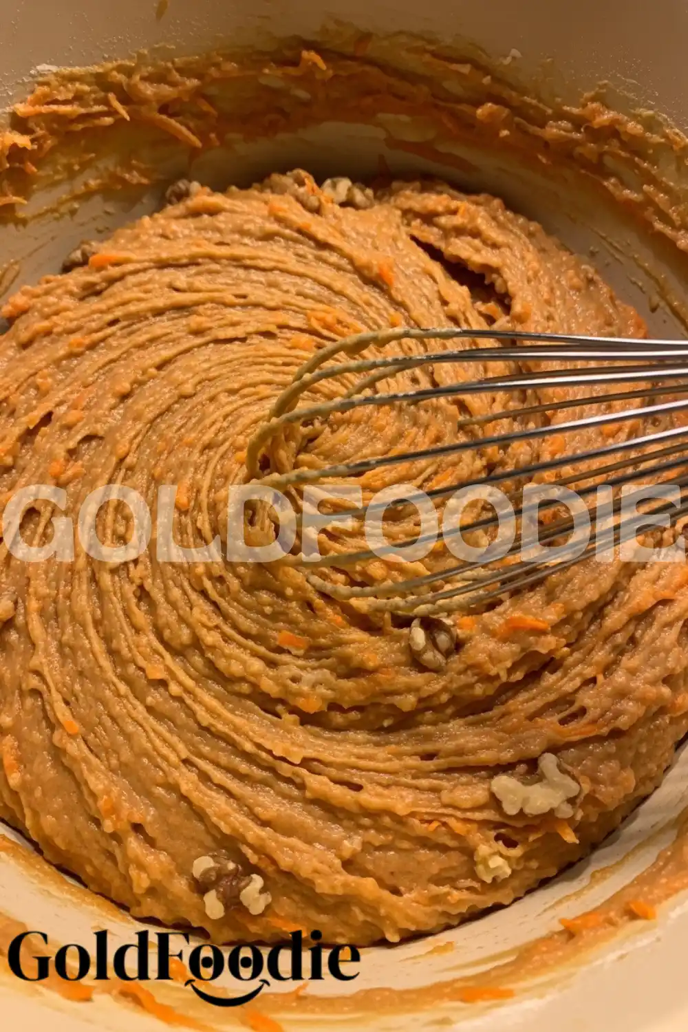 whisking-carrot-cake-batter-with-walnuts whisking-carrot-cake-batter-with-walnuts