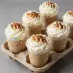 Chai Latte's Fall Core Vibes 4 A steaming cup of chai latte surrounded by autumn leaves and spices