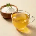 How to Make Bloom Gelatin Drink and Its Uses 3 A glass of vibrant Bloom gelatin drink garnished with fresh fruits and herbs
