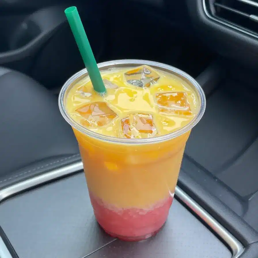 Pineapple Mango Rebel with Strawberry Drizzle 5 A refreshing Pineapple Mango Rebel drink topped with a vibrant strawberry drizzle