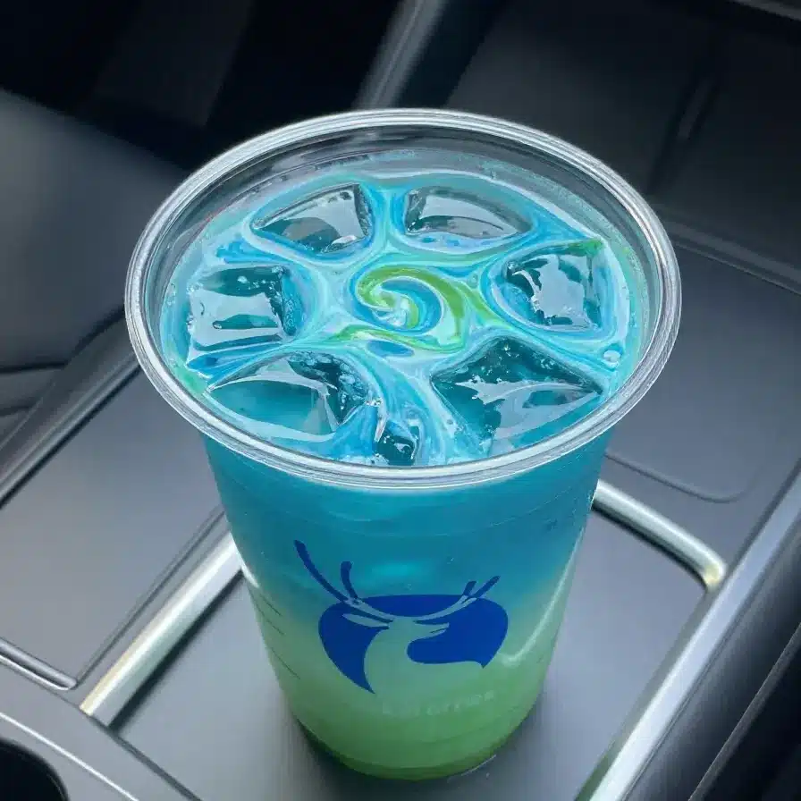 Windmill Drinks with Blue Raspberry Drizzle 5 Colorful windmill drinks topped with blue raspberry drizzle