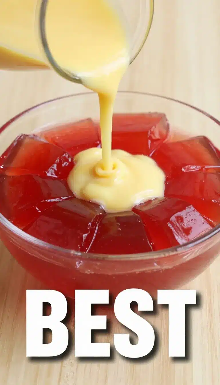 This French Chef is a Genius: Jelly Mold Dessert with Custard 10 A beautifully presented jelly mold dessert topped with custard, created by a French chef.